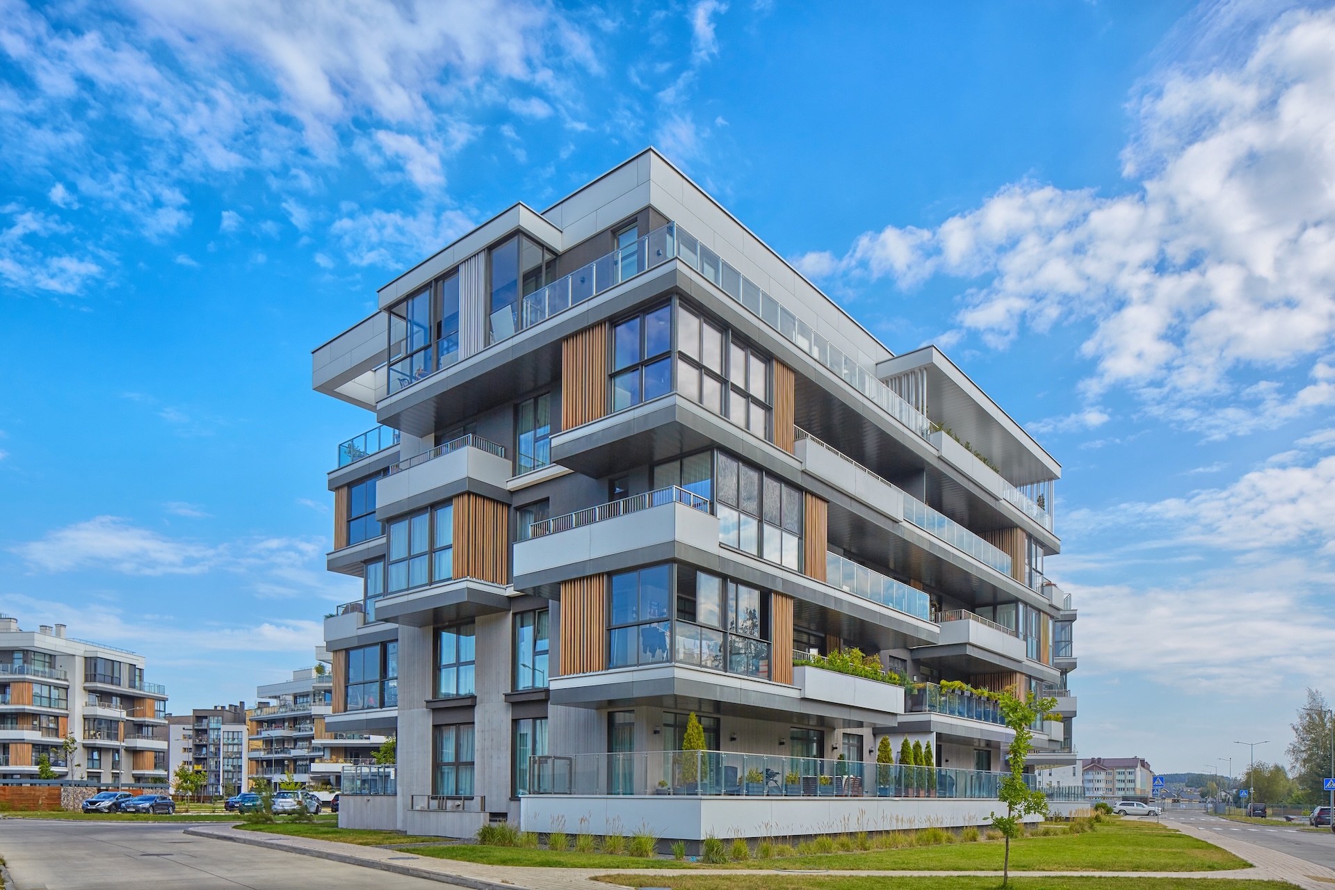 New modern block of flats in green area. residential apartment with flat buildings exterior. luxury house complex. Part of City Real estate property, condo architecture. apartment insurance concept.